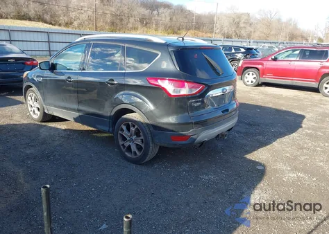 2014 Ford Escape Titanium z USA, uszkodzony, nr VIN 1FMCU0J9XEUA45182